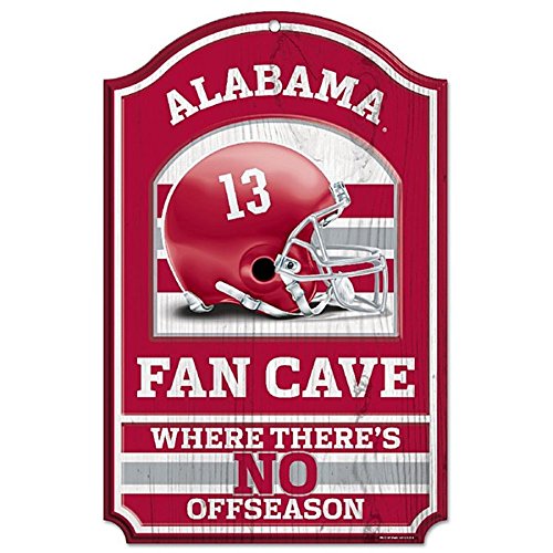 WinCraft Collegiate Fan Shop Authentic NCAA Fan Cave Wooden Sign. Stake Your Territory with This Sign. For the Office or Man Cave. This 11"X17" Sign Let's Everyone Know Your Team